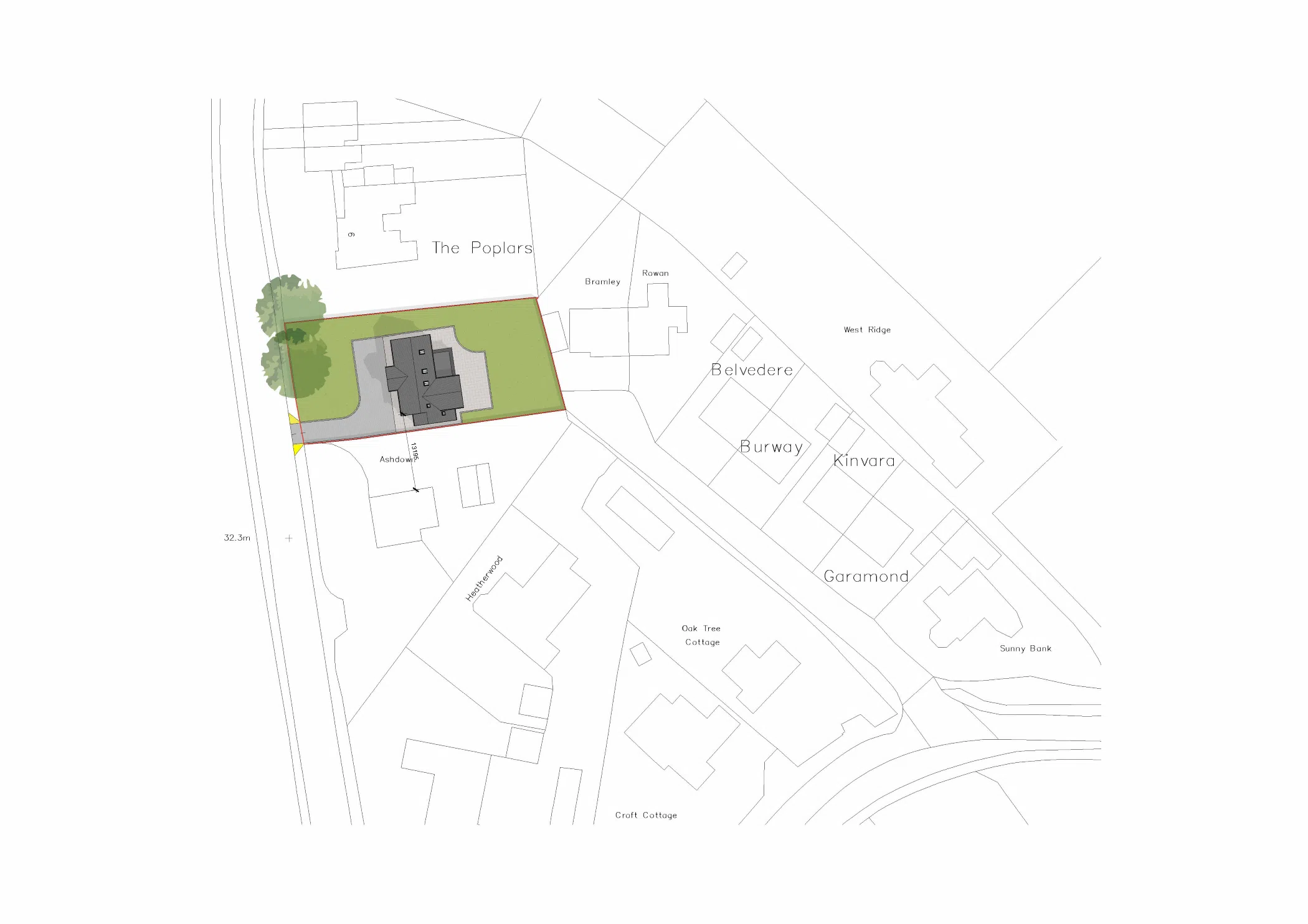 Site plan showing a proposed house on a rectangular green plot with driveway, two trees at the left and neighbouring property outlines labeled.